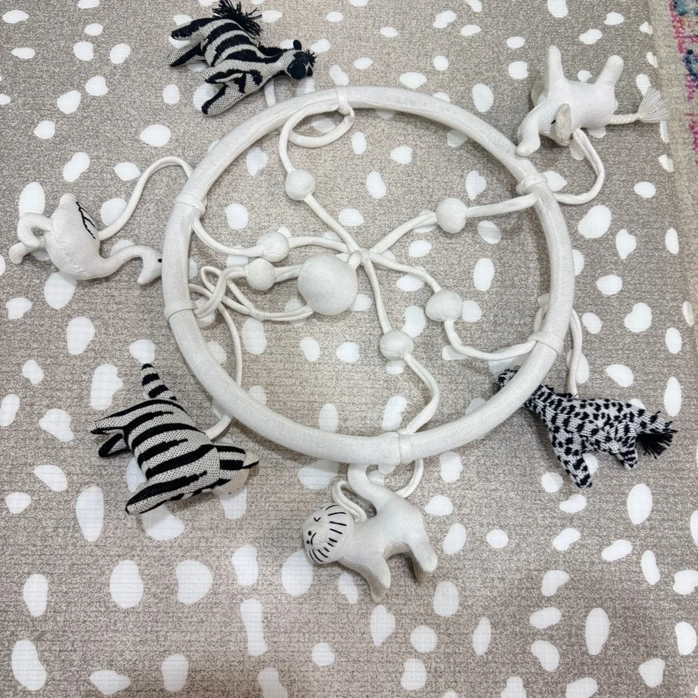 Crate & Barrel Baby Nursery safari animals mobile crib decor newborn neutral